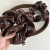 Goma para el pelo coreana de color café con lunares azules de alta gama para mujer, accesorio de pelo retro versátil para coleta baja