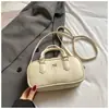 Bolsa de Bowling de Mano Estilo Simple y Dulce Nueva Colección Primavera 2026 Bolso Cruzado Casual de Moda Elegante de Alto Valor para Mujer