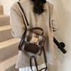 Bolso de estudiante de moda vintage para otoño e invierno, mochila informal de moda para mujer, bolso de hombro de alta gama de nicho 2024