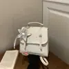 Mochila niche estilo coreano com estampa de estrelas para mulheres, bolsa de mão da moda 2026, mini mochila casual para o dia a dia