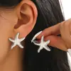 Pendientes de estrella de mar dorada transfronterizos de moda europea y americana, modernos y únicos, lujo ligero con un toque de alta gama, accesorios marinos, joyería para mujer en plata