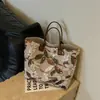 Bolso Casual de Moda de Alto Estilo para Viajes Diarios de Verano 2026 con Bordado Floral Tridimensional y Gran Capacidad Tipo Tote