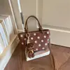 2026 Nuevo Diseño de Lunares Bolso de Hombro Tipo Cubo Diario Bolso para Ir al Trabajo Bolso de Mano Versátil Casual Bolso Cruzado