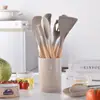Utensílios de cozinha de silicone transfronteiriços 12 peças panela antiaderente espátula espátula cabo de madeira barril ferramenta de cozinha terno