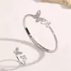 Moda Transfronteriza Europea y Americana Exquisito Conjunto de Anillo y Pulsera Completa de Diamantes Mariposa Madreperla Abrible Joyería de Mano de Pulsera de Lujo Ligero de Gama Alta
