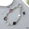 Ins Nuevo Colgante de Llavero con Lentejuelas y Lazo de Perlas para Funda de Teléfono Móvil Accesorios de Correa de Muñeca para Lanyard de Teléfono Móvil