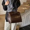 Bolso Tote Retro Platino de Moda Exquisito Versátil Portátil Tipo Kelly Nuevo 2026 Bolso de Hombro Cruzado Único