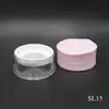 El fabricante suministra caja redonda morada para polvos sueltos 16g material de embalaje de polvo fijador plástico contenedor cosmético