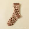Calcetines nuevos de algodón aterciopelado otoño e invierno estampados de dibujos animados cálidos absorbentes de sudor calcetines de tubo ins vintage calcetines de pantorrilla mujer mayoreo