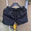 Pantalones cortos deportivos casuales de verano para hombre, pantalones cortos de tres puntos, pantalones cortos de playa de secado rápido, pantalones grandes, pantalones de pijama para pareja en casa.