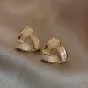 Aretes de perlas estilo lujo ligero para mujer al por mayor temperamento de Corea del Sur aretes netos rojos nuevos aretes de moda alto sentido