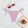 Nuevos Sexy 2026 Triángulo Aguas Termales Color Sólido Estilo Europeo y Americano Bañador para Hombre Venta al por Mayor Transfronterizo Atado Traje de Baño de Playa Bikini para Mujer