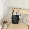 Moda Femenina Verano 2026 Transfronterizo Patrón Tejido Hueco Bolso Pequeño Casual Mini Bolso Cruzado para Hombro para Teléfono Moderno