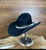 Nuevo sombrero de fieltro transfronterizo cinta decorativa sombrero de lana moderno todo-partido sombrero de lana negro