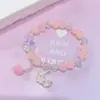 Nuevo Pulsera de Cristal Color Crema para Mujer, Joyería Versátil Estilo Ins Primavera y Verano, Pulsera de Vidrio Flor y Luna al por Mayor