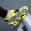 7998 Zapatos Deportivos al por Mayor para Niños de Comercio Exterior Zapatos de Primavera Verano para Niños Grandes Zapatos de Moda Zapatos de Tejido Volador Superficie Vacía Nueva para Niños