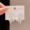 Pendientes de Flor con Goteo de Aceite y Moño de Circonita Estilo Vintage Aguja de Plata, Pendientes Dulces de Moda y Delicados con un Toque de Lujo Ligero y de Alta Gama