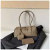 Bolsa de Ombro Retro para Comércio Exterior Feminina 2026 Novo Estilo Moda Estilo Coreano Bolsa Bowling de Alta Qualidade para Deslocamento Bolsa de Ombro Único