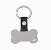 Chaveiro Criativo Vazado Patinha de Cachorro Osso Aço Inoxidável Pingente Couro Metal Placa de Nome de Animal de Estimação Pingente Venda Quente Transfronteiriça