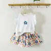 Conjunto de Verano para Niñas 2026 Nuevo Estilo Camiseta de Manga Acampanada para Niños Pantalones de Falda Floral Conjunto de Dos Piezas
