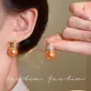 Brincos de Pérola Laranja Rosa Champagne para Mulheres Modernos Únicos Sensação de Alto Padrão Brincos de Tarraxa Estilo Retrô Hong Kong Luxo Leve Temperamento de Nicho Acessórios para Orelha