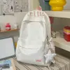 Mochila com padrão de ondas azul leitoso, estilo claro e artístico, estilo coreano, suave e versátil, adequada para viagens e passeios, faz o usuário parecer mais claro.