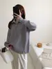 Suéter de punto de estilo simple, nuevo para otoño e invierno, comercio exterior transfronterizo, corte holgado, media cremallera, cuello alto, diseño elegante, suéter para mujer