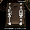 Pendientes de aleación con diamantes de imitación de estilo europeo y americano, de alta gama, estilo retro, largos, con forma de gota de agua, de lujo, combinables con todo.