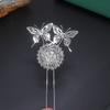 Aleación electroforesis conservación del color nuevo horquilla de flor mariposa china nicho de alta gama baño de plata horquilla en U joyería al por mayor