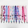 Nuevo cordón para el cuello de teléfono móvil con estampado floral de dibujos animados por transferencia térmica, bolsa cruzada para hervidor de agua para mujer, cordón universal, venta al por mayor