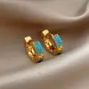 Aretes de Flor Redonda de Circonia Chapados en Oro Real de 18k Pasadores Sencillos con Sentido de Diseño de Nicho Pendiente Vintage
