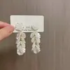 Pendientes de Borlas Estilo Francés Super Hada Pequeños Frescos Explosivos Moda Temperamento Lujo Ligero Alto Sentido Joyería Delicada de Oreja de Camelia