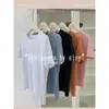 Camiseta Blanca Sencilla y Versátil con Cuello Redondo y Hombros Rectos, Mangas Cortas, Nuevo Estilo Verano 2026, Camiseta Base Corta Ajustada para Mujer