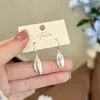 Novos brincos pingente chineses de prata escovada para mulheres, sensação de alta qualidade, ganchos de orelha únicos e deslumbrantes, joias de ouvido modernas e elegantes para rostos quadrados e redondos