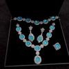 Juego al por mayor de calcedonia helada azul celeste con incrustaciones plateadas, aretes de ágata azul celeste, pulsera, vestido de noche, juego de jade de cuatro piezas