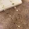 Cadena de Suéter con Lazo de Perlas y Piedra Ojo de Tigre Estampado de Leopardo Maillard, un collar elegante y versátil para mujer, perfecto para otoño e invierno, con un toque de lujo y sofisticación