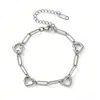 Pulsera de Acero de Titanio Corazón Hueco de Lujo Ligero, No se Desvanece, Joyería de Nicho de Gama Alta para Commuters para Mujeres, Venta al por Mayor de Fábrica, Personalizable