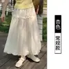 Primavera/Verano 2026 Nuevo Estilo Coreano Estilo Suave Falda Media Cintura Alta Adelgazante Dobladillo Amplio Falda Larga Falda de Botón de Flor de Capullo Mujer
