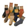 Nuevos Calcetines de Otoño e Invierno para Hombres y Mujeres Calcetines Gruesos Cálidos con Forro de Felpa Japonés calcetines de toalla de piso de tres rayas de rizo calcetines de tubo medio