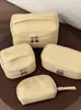 Bolsa organizadora de maquillaje, diseño pequeño de color amarillo mantequilla, juego de bolsas de maquillaje portátil y de gran capacidad, ideal para viajes y artículos de tocador