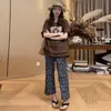 Conjunto de moda para mujer 2026 verano nuevo estilo, top holgado de manga corta de moda con pantalones de pierna ancha estampados, conjunto de dos piezas casual