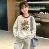 Camiseta listrada de manga longa 100% algodão para meninas, novo estilo primavera e outono 2026, top versátil casual ins, camiseta básica infantil, moderna