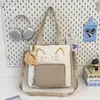 Nueva y linda bolsa de tutoría estilo coreano para estudiantes de primaria, bolsa de mano tipo tote de gran capacidad para un solo hombro cruzada, bolsa de tutoría para ir a clases