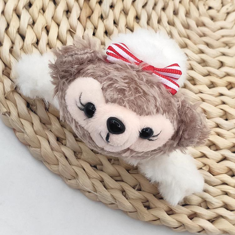 小蝴蝶结达菲熊毛绒抓夹10