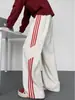 Pantalones de estilo americano con patrón de escamas de dragón en bloques de color para hombre, pantalones deportivos casuales de pierna recta para otoño, pantalones holgados de pierna ancha, modernos y elegantes