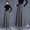 Moda Femenina Versátil de Lana a Cuadros de Cintura Alta Línea A Acampanada Falda Nueva Otoño/Invierno 2026
