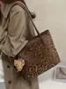 Bolso de mano retro estilo coreano, gran capacidad, diseño nuevo, adecuado para ir al trabajo y uso casual, bolso de compras con estampado de leopardo para mujer