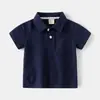 Nueva camiseta tipo polo casual de verano estilo coreano para niños y niñas, con diseño de manga corta y un look simple y versátil