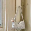 Bolsa de lona floral casual estilo coreano para mulheres, novo modelo de início de outono 2026, bolsa de ombro e transversal casual, bolsa quadrada pequena de alta aparência