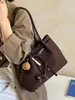 Bolsa tote casual personalizada da moda, design de nicho, bolsa nova de alta qualidade, bolsa de ombro feminina da moda para o inverno de 2026